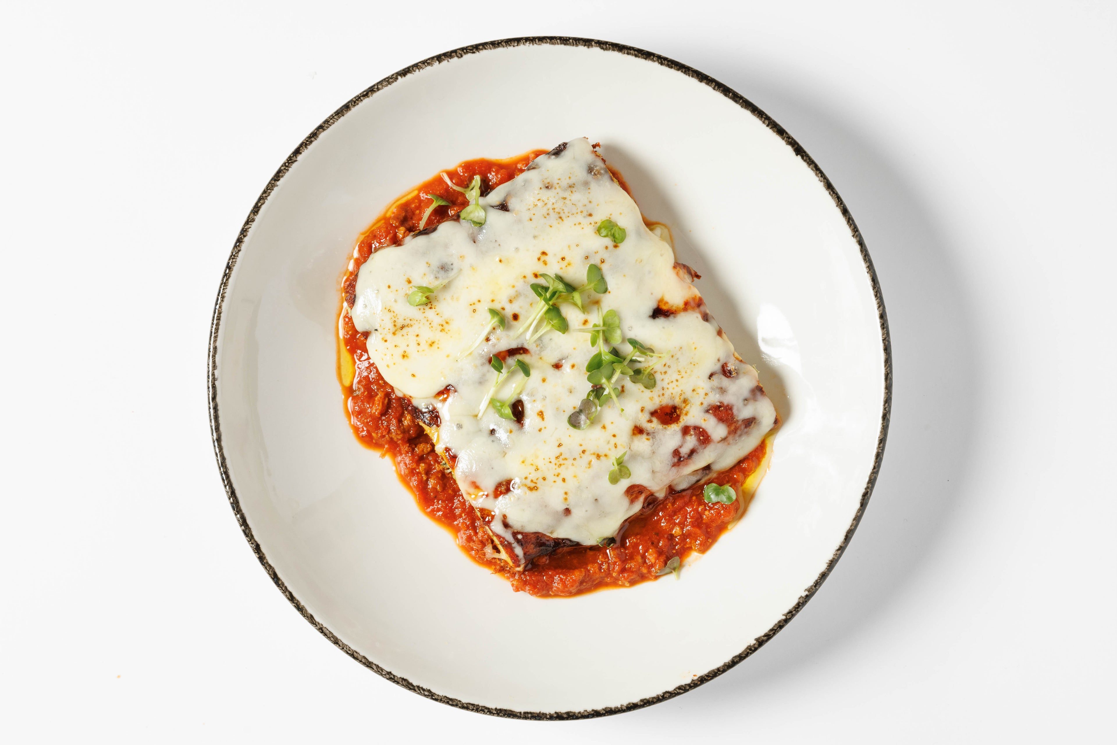 Канелоні зі шпинатом та сиром рікотта